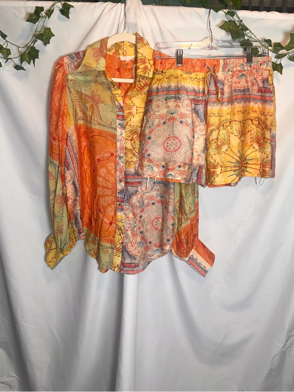 Luxxel Orange & Yellow Printed Elastic-Waist Bermuda Shorts with matching Shirt.